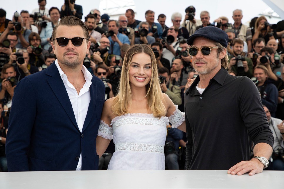 Leonardo DiCaprio, Margot Robbie and Brad Pitt pose for photographers at the photo call for the film 'Once Upon a Time in Hollywood' at the 72nd international film festival, Cannes, southern France, Wednesday, May 22, 2019