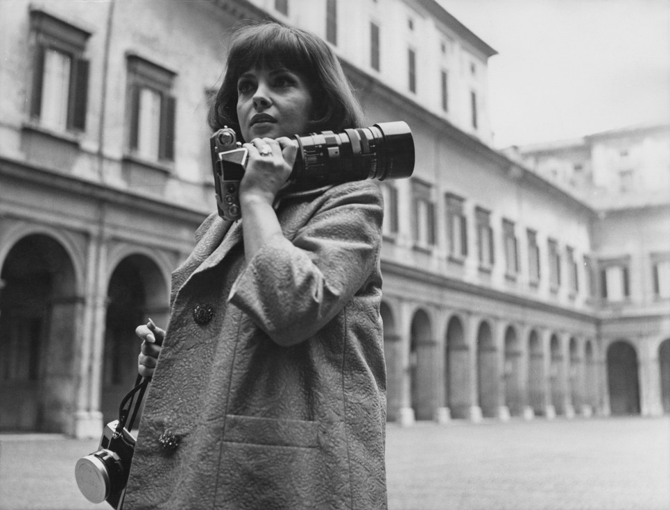 Italian actress Gina Lollobrigida photographs the David di Donatello film awards at the Quirinal Palace in Rome, Italy, 12th March 1964.