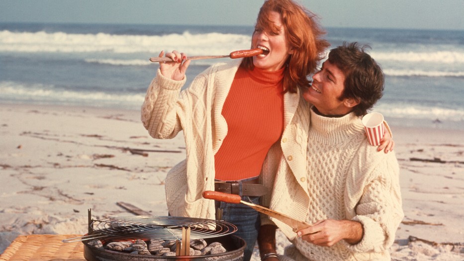1970s COUPLE GRILLING HOT...