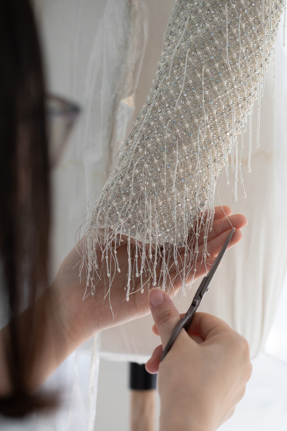 Aprócska gyöngyökkel díszítették Céline Dion Dior ruháját