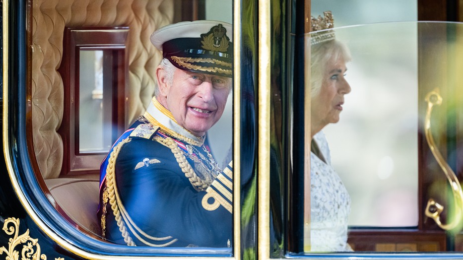 King Charles III and Queen Camilla travel down the Mall by carriage on their way to the Houses of Parliament for The State Opening of Parliament on November 07, 2023 in London, England