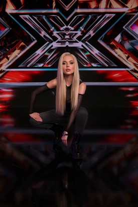 Korábban, 2022-ben az X-Faktorban tűnt fel, melynek köszönhetően a magyar közönség is megismerhette. 