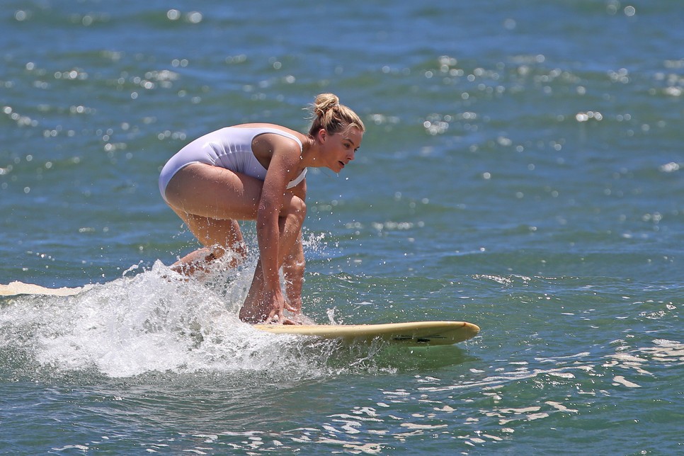 2016** Margot Robbie surfing in Hawaii
