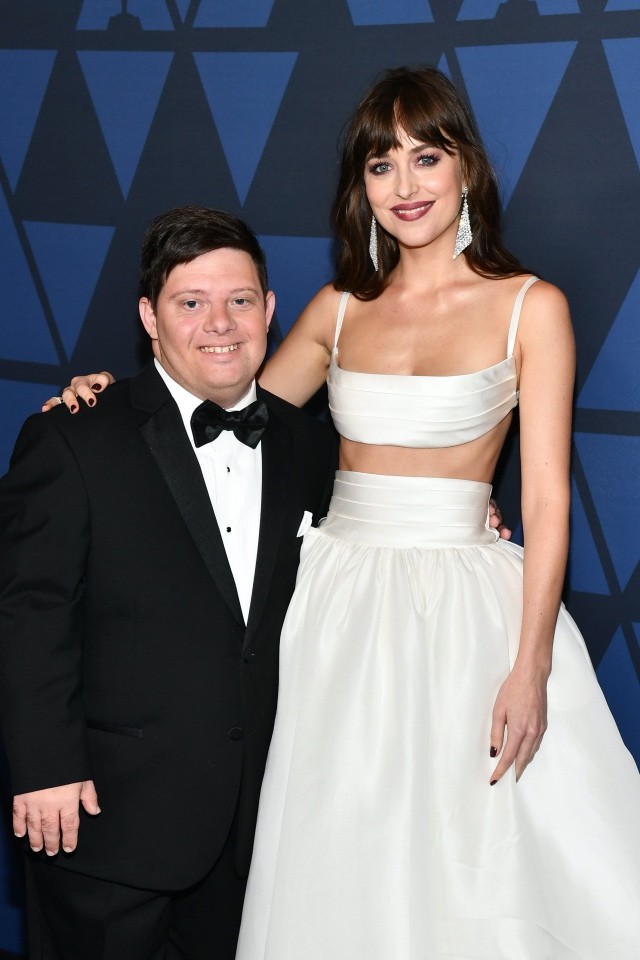 Dakota Johnson Zack Gottsagen