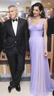 2017 - Három hónappal az ikrek szülése után a pár visszatért a Velencei Filmfesztivál vörös szőnyegére. Amal Clooney egy romantikus Atelier Versace sifonruhát viselt, káprázatos lila árnyalatban. A szokásos hosszú hullámok helyett Amal most egy bob frizurával jelent meg. 