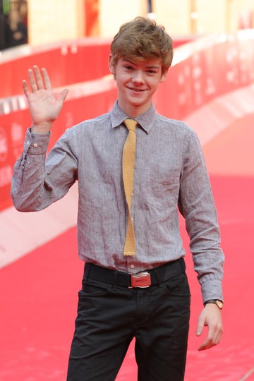 Thomas Brodie-Sangster 2011-ben az Egy szuperhős halála római premierjén