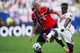 A futballklasszis kíméletlen harcot vívott az angol védővel, Marc Guéhivel a labdáért a világbajnoki negyeddöntő kiélezett pillanataiban.